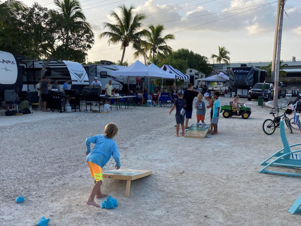 Kids playing cornhole at the RV resort on Big Pine Key in the Florida Keys.