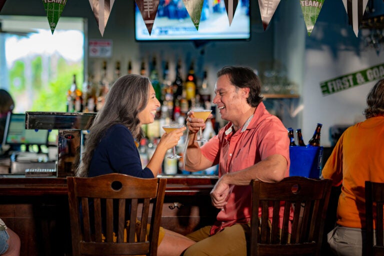 Cypress Lakes Village - couple at bar