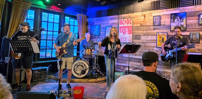 Music group, The Sandspurs, performs live at Big Cypress Grill at Cypress Lakes Village in Lakeland, FL.