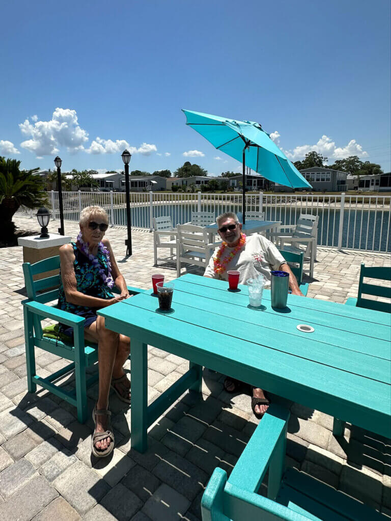 Residents on the renovated patio The Meadows in Tarpon Springs, Florida.