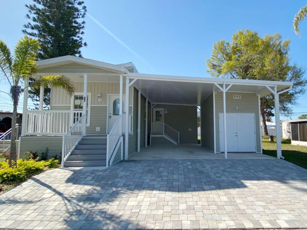 The front exterior of the new manufactured home at 10 Sophie Avenue, Dunedin, Florida 34698 in Dunedin Village.