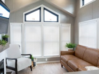 Inside the living room of an Elevation park model cabin at Sebago Lake at Point Sebago Resort.