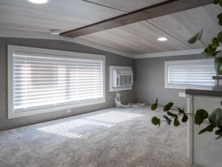 Loft space inside an Elevation park model cabin at Sebago Lake at Point Sebago Resort.