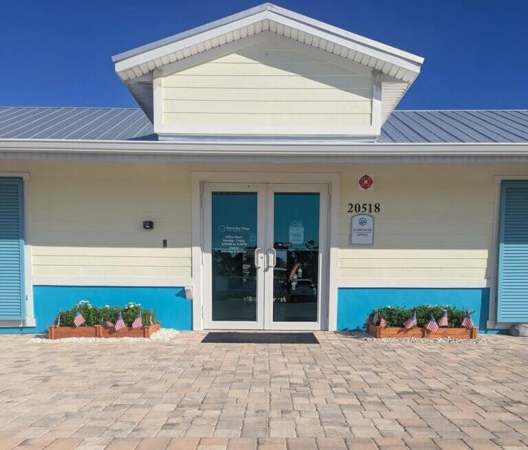 Exterior of the clubhouse at Estero Bay Village in Florida.