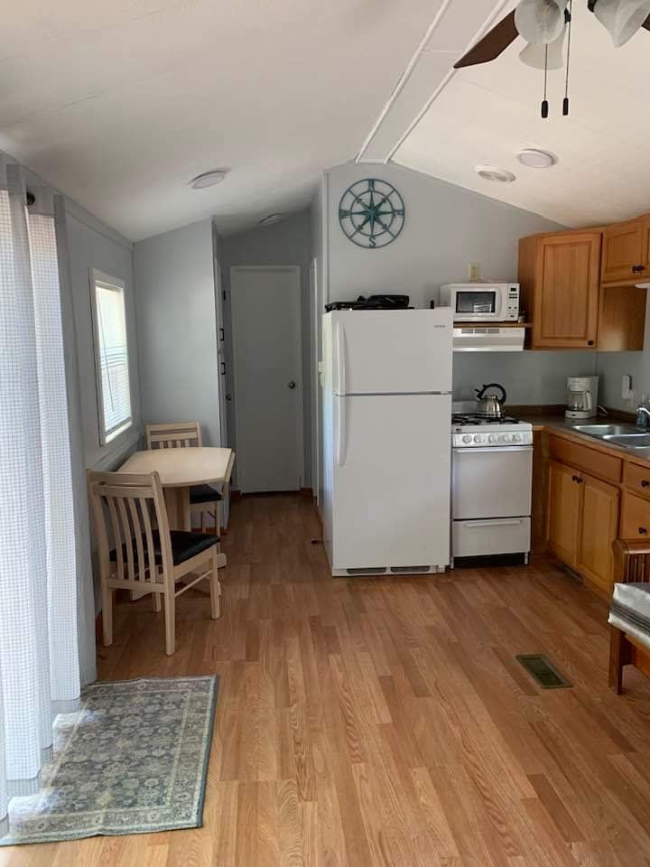 kitchen and table with 2 chairs