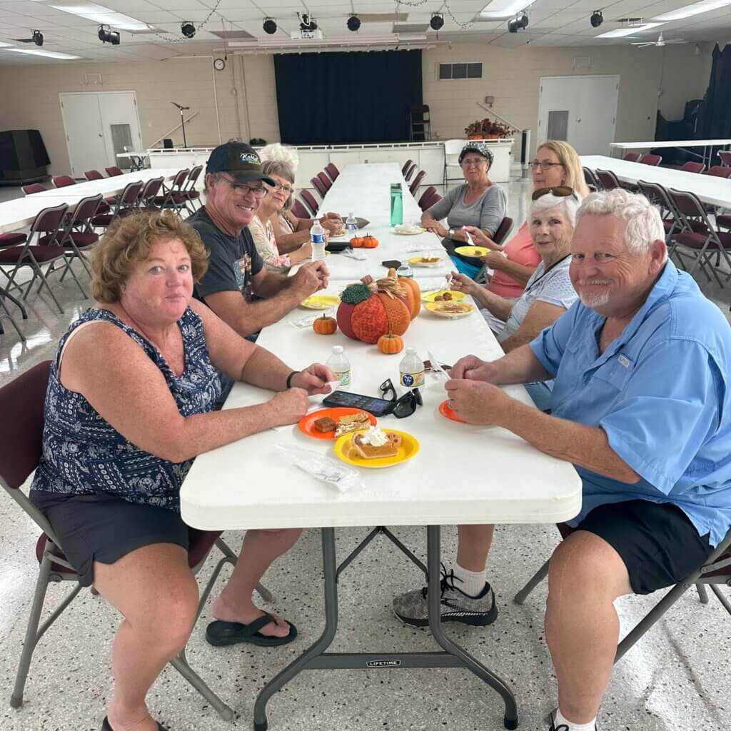 Guests enjoying fall desserts in the Activity center at Holiday RV Park.