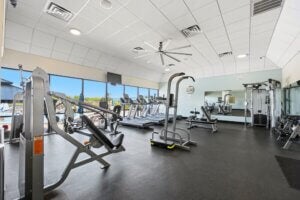 Fitness center in the remodeled clubhouse at Camelot East Village in Sarasota, Florida.