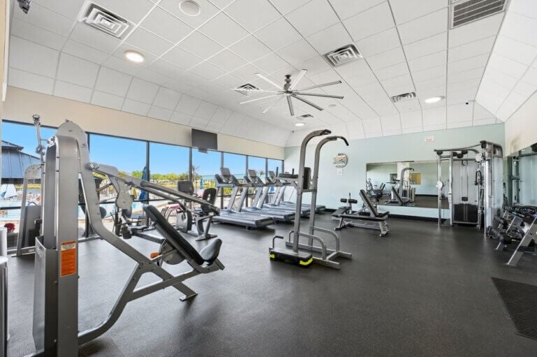 Fitness center in the remodeled clubhouse at Camelot East Village in Sarasota, Florida.