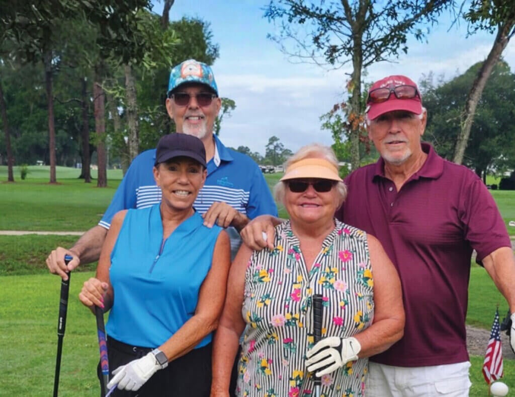 Couples on the golf course in Rolling Greens Village in Ocala, Florida.