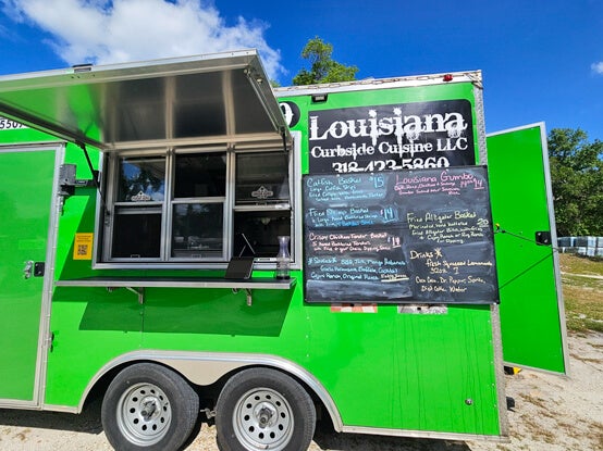 Louisiana Curbside Cuisine LLC Food Truck Parked brings Southern style dishes to Holiday RV Park in Leesburg, FL.