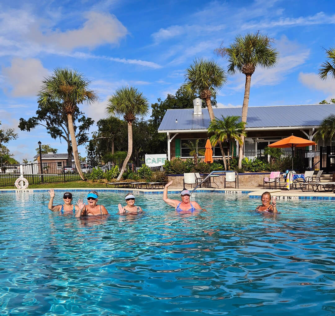 guests participating in aqua aerobics in the pool at Holiday