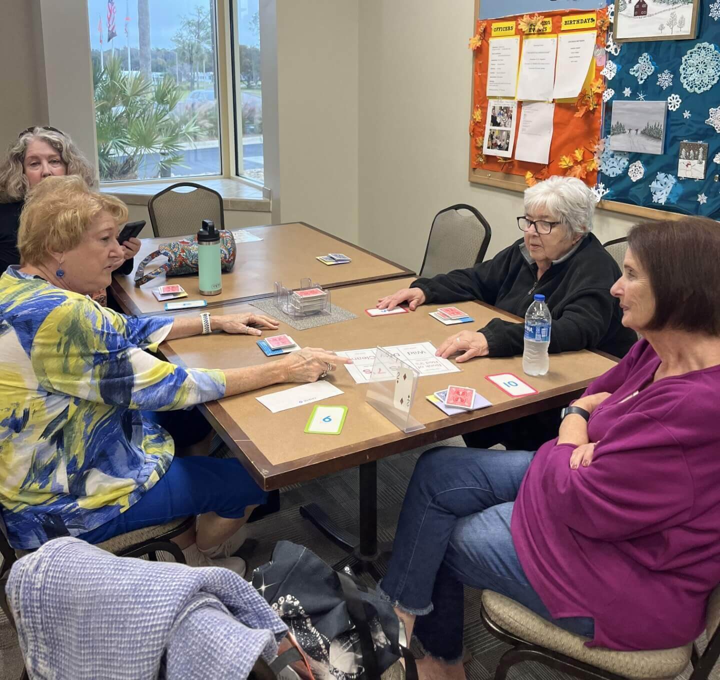 Residents at Cypress Lakes Village in Lakeland, FL. playing Hand, Knee, & Foot.