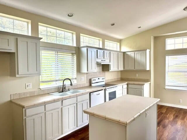 A kitchen inside a mountain view village home
