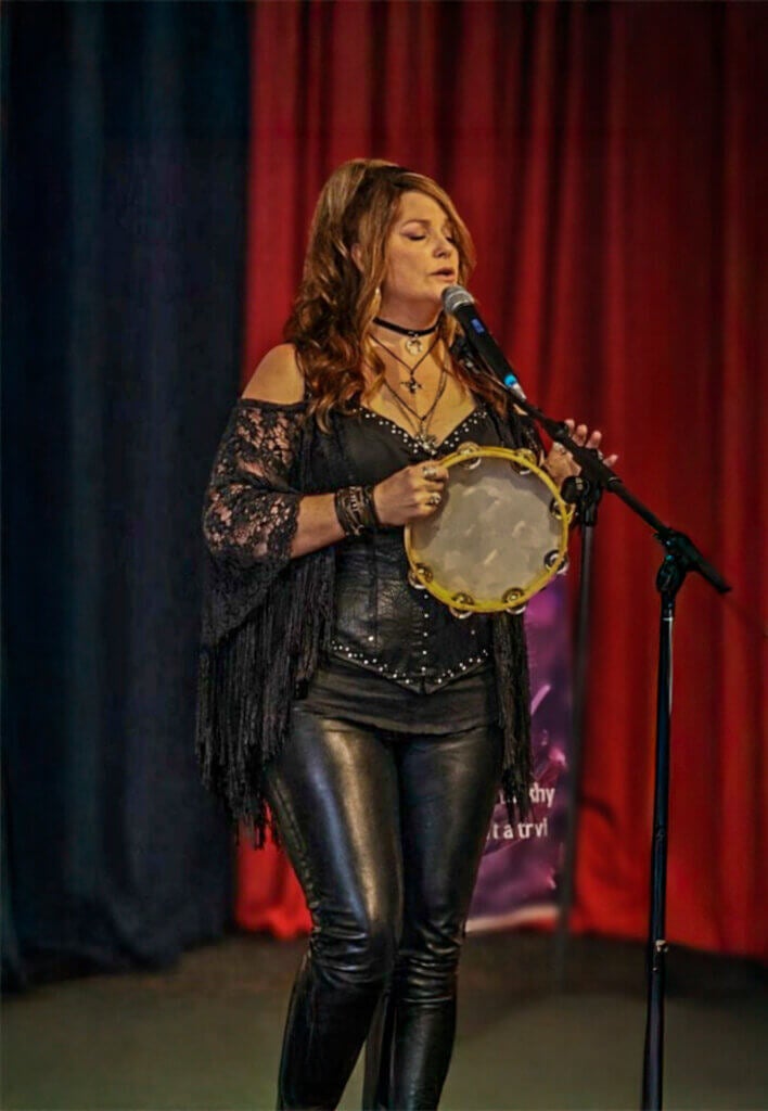 Live music by Lori Staten on stage performing for guests at Holiday RV Park in Leesburg, Florida.