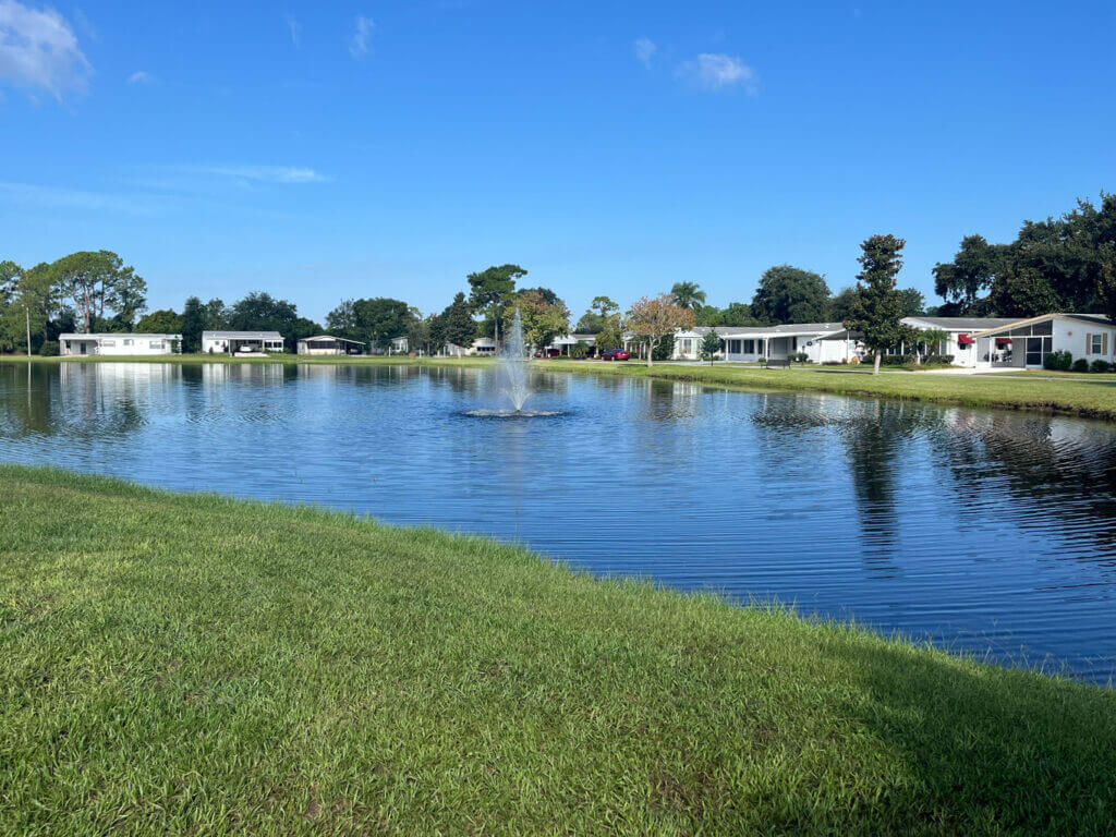 Manufactured homes with a water view at Meadowlea Village in DeLand, Florida