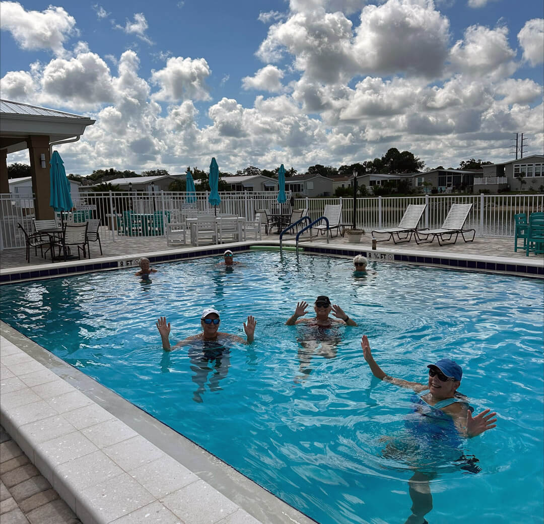 6 residents at the meadows in the community pool for a water aerobics workout