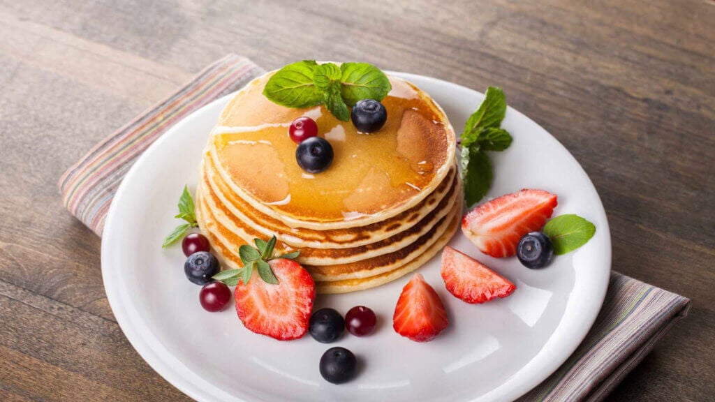 Pancakes with fruits by DAPA Images in Canva