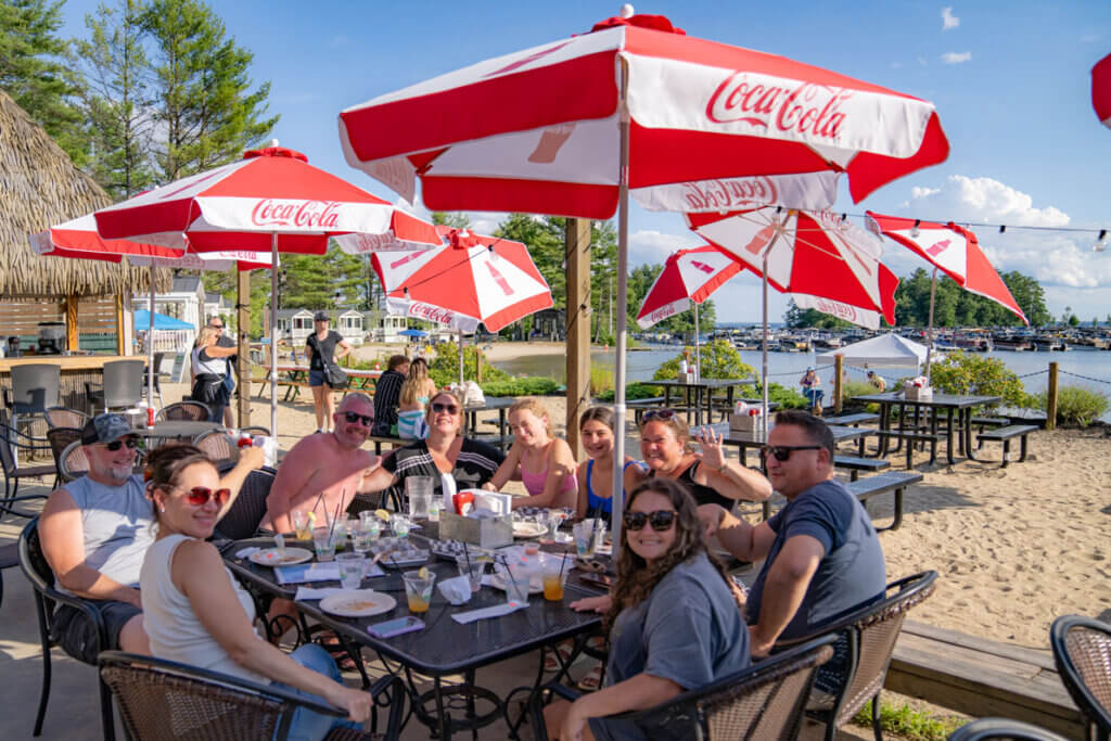 Family eating at the restaurant at Point Sebago Resort in Casco, Maine.