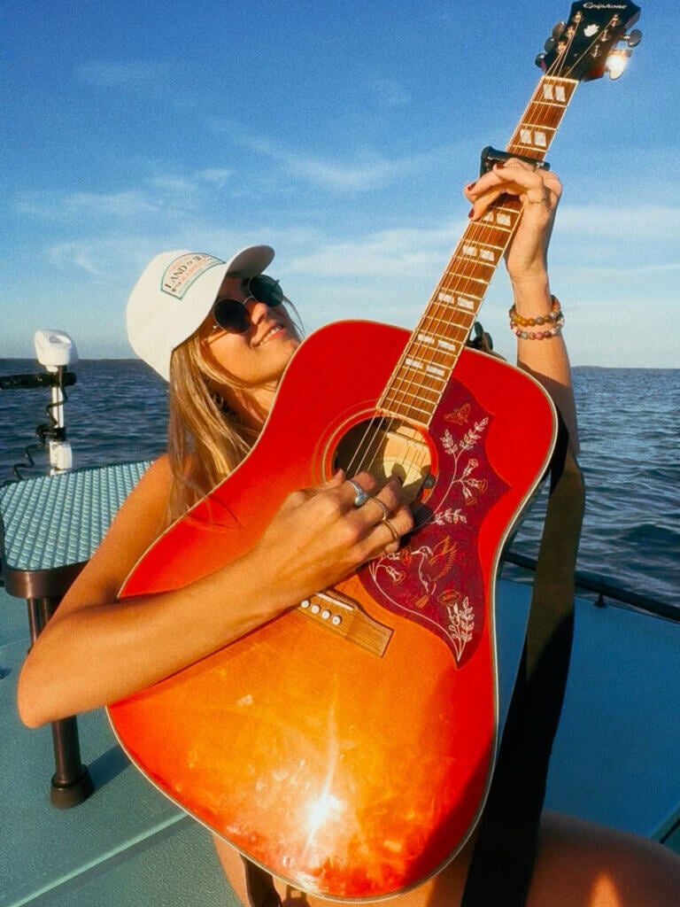 Peytan Porter playing music in the Florida Keys
