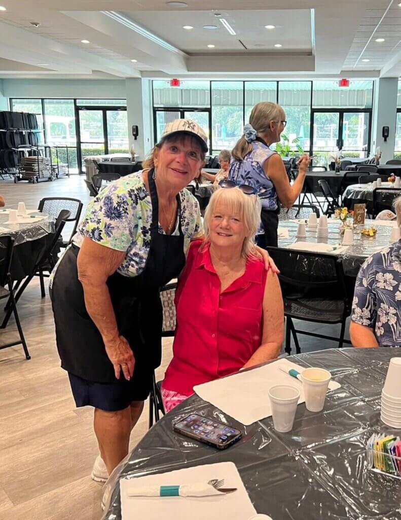 Residents at Breakfast Club lifestyle event at Rolling Greens Village.
