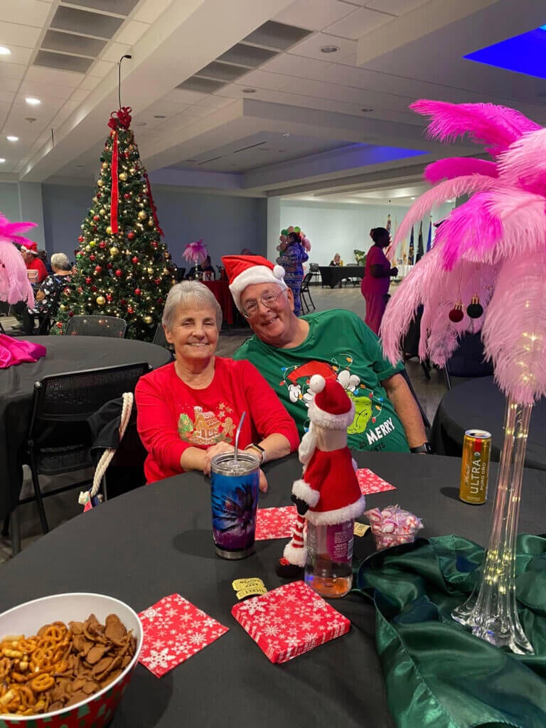 Residents at Rolling Greens Village in Ocala, FL attend the Holiday Party.