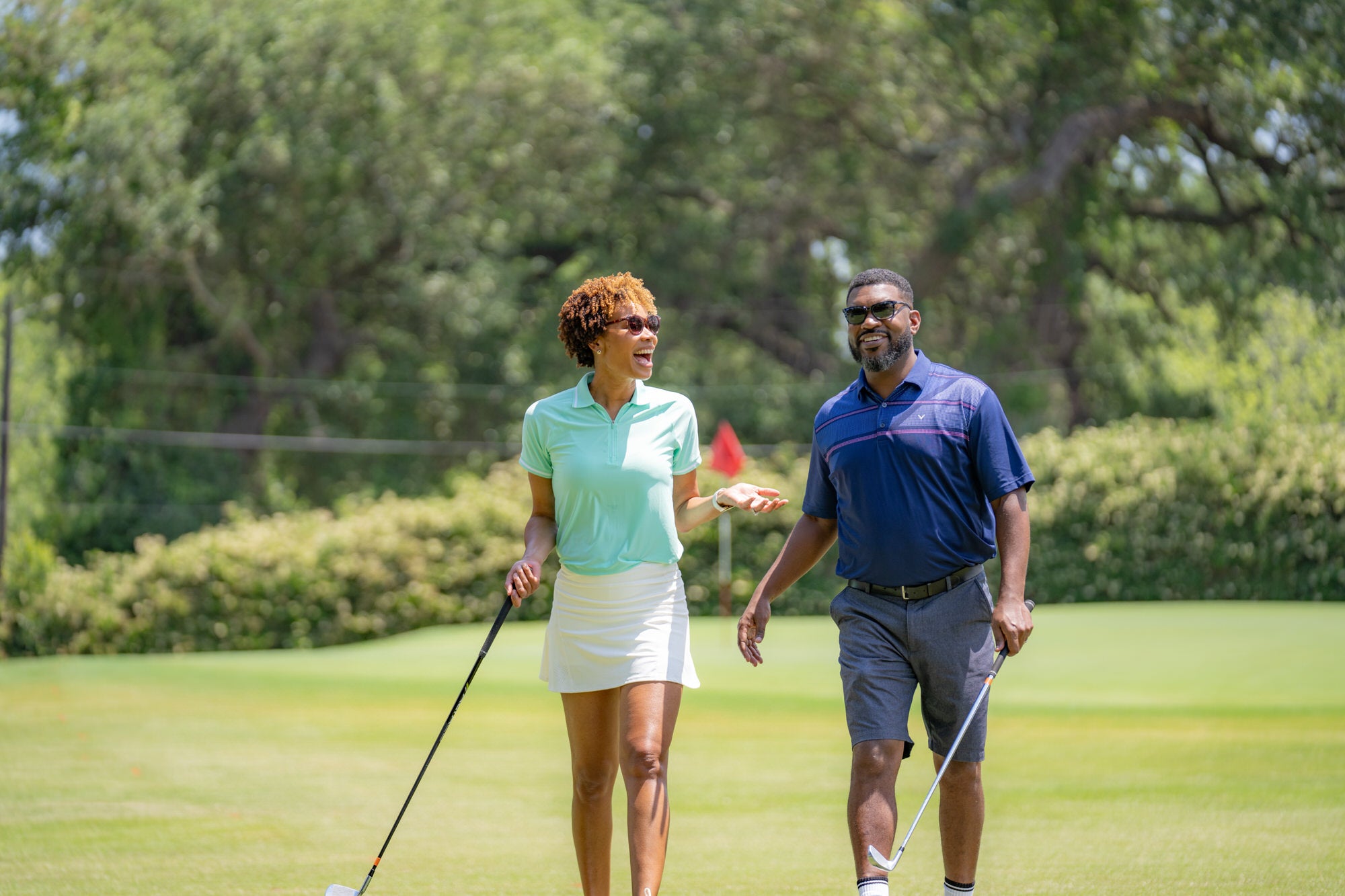 couple playing golf