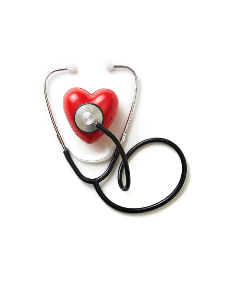Stethoscope over heart stock photo