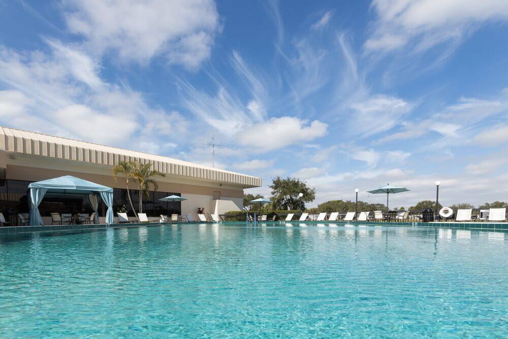 Swimming pool patio at Camelot East Village in Sarasota, Florida.