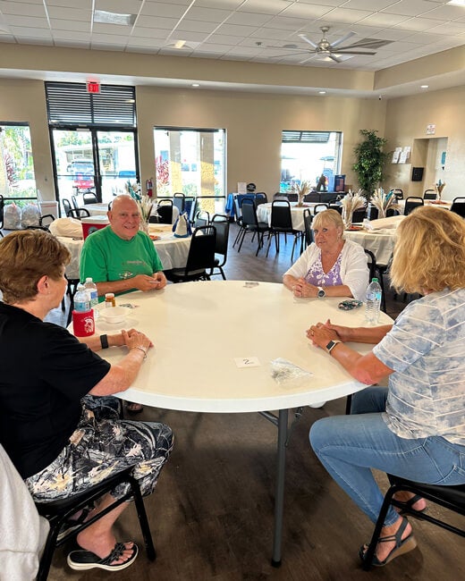 55+ Residents playing Euchre at The Meadows in Tarpon Springs, FL.