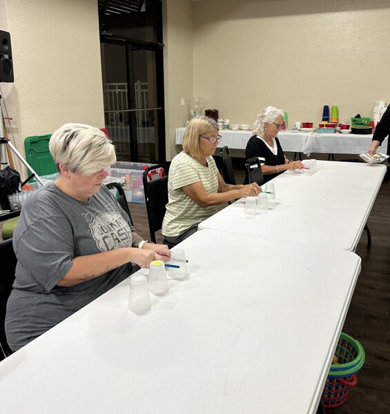 55+ Residents playing games at Music Mania Bingo Night at The Meadows in Tarpon Springs, FL.