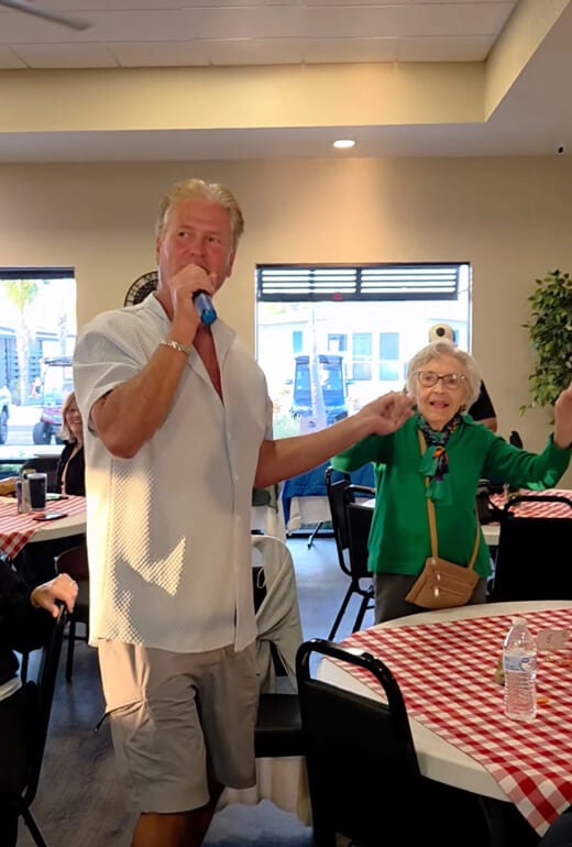 55+ Residents doing karaoke at The Meadows in Tarpon Springs, Florida