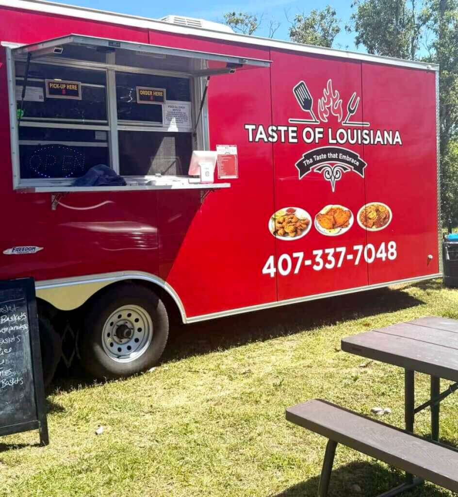 The Tase of Louisiana Food Truck trailer is Parked in Holiday RV Park in Leesburg, Florida.