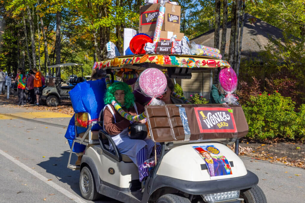 A golf cart decorated for Halloween with Willy Wonka candy at Point Sebago Resort in Maine.