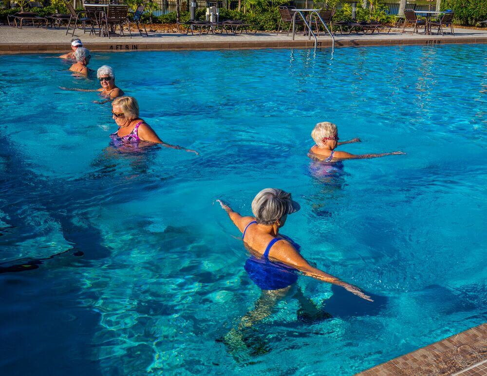 A group of women doing pool aerobics at Cypress Lakes Village in Lakeland, Florida.