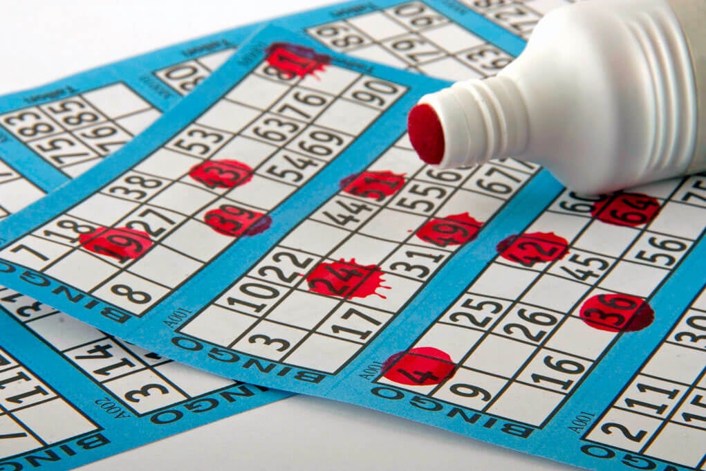 bingo card and a red dabber
