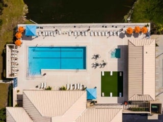 Birds eye view of Camelot Lakes Village swimming pool.