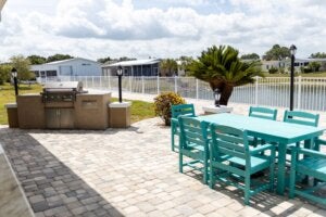 The grill and updated patio furniture at The Meadows clubhouse in Tarpon Springs, Florida.