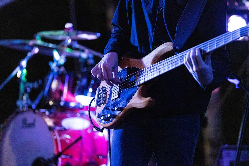A musician playing the guitar.