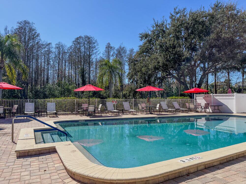 Chairs and umbrellas line the swimming pool at Sun Valley in Tarpon Springs, Florida.