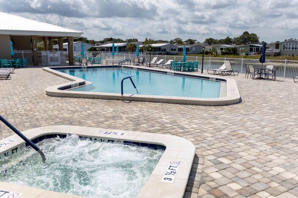 The spa/hot tub and swimming pool at The Meadows clubhouse in Tarpon Springs, Florida.