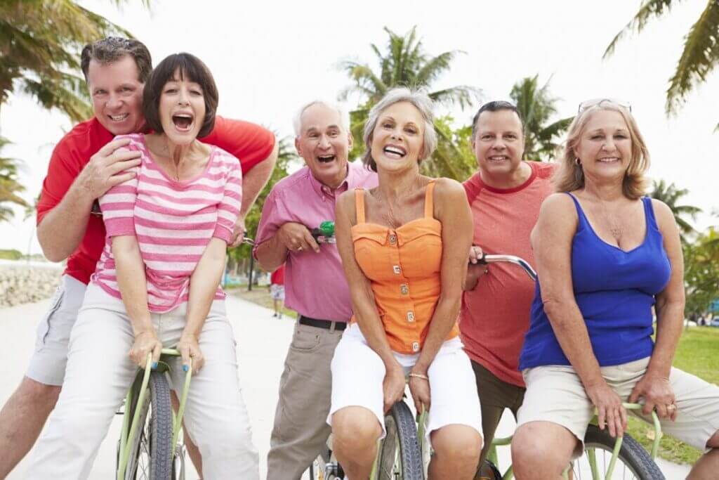 Group of people sitting on bikes