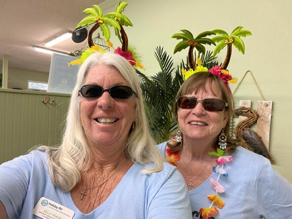 Lifestyle managers take a selfie at holiday RV Park in Leesburg, Florida.