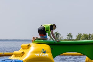 kid crawling on waterpark