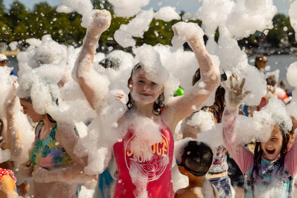 girl covered in foam