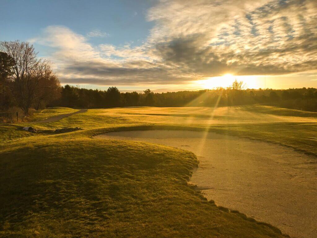 Point Sebago golf course sand trap with sunrise