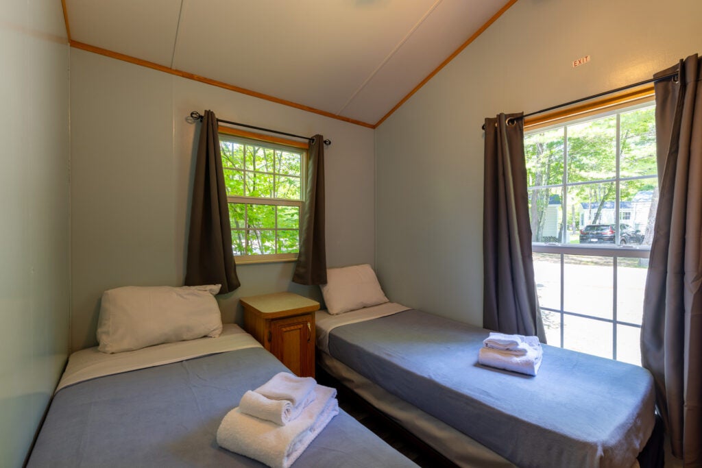 Two twin beds in second bedroom.