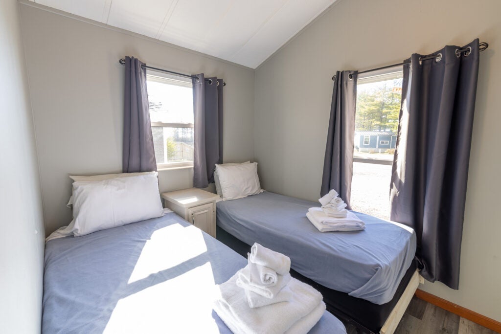 Two twin beds in second bedroom.