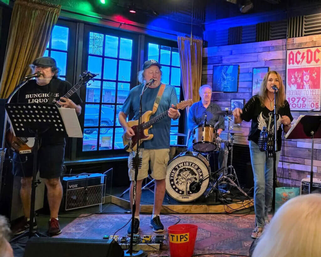 The SandSpurs band playing live music at a Florida venue.