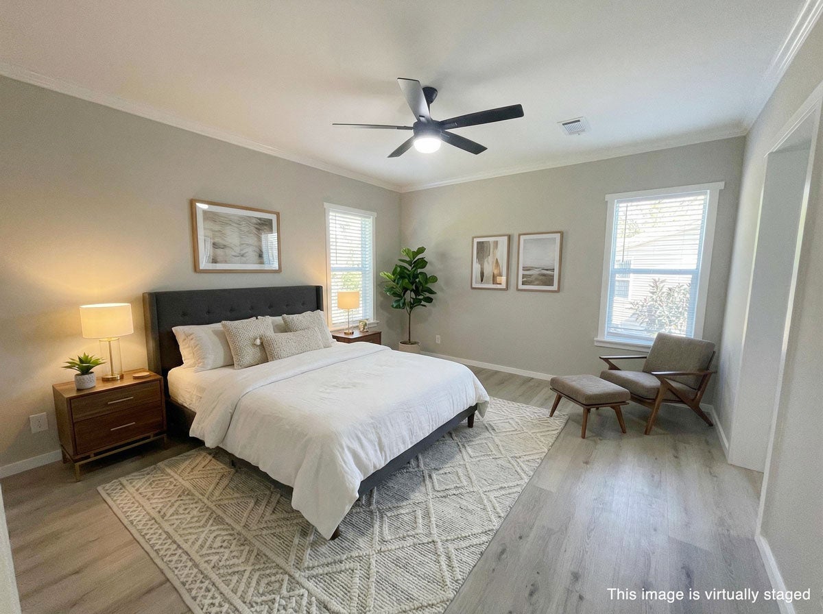 Virtually staged bedroom in a manufactured home for sale in Lakeland, Florida at Cypress Lakes Village.