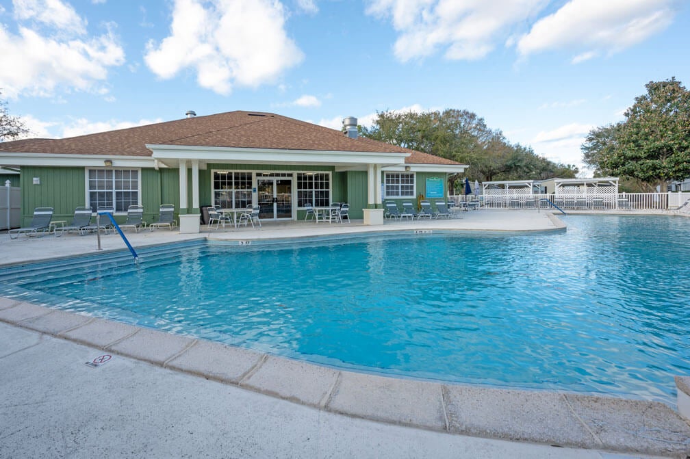 Clubhouse swimming pool and heated spa at one of three clubhouses at Bear Creek Village